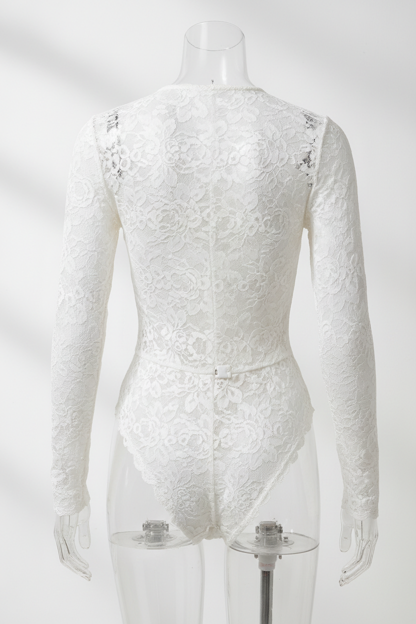 Ivory lace bodysuit - back view on mannequin showing snap closure