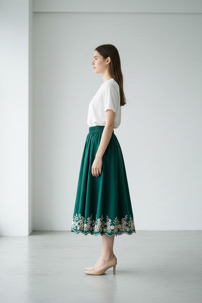 Forest green embroidered midi skirt - model side view