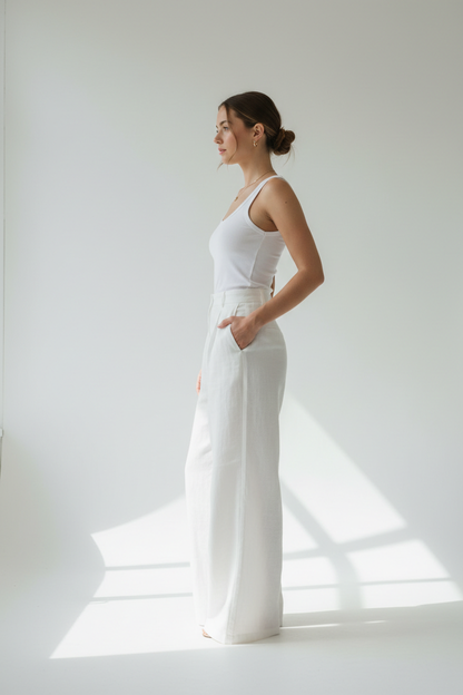 White wide-leg linen trousers - model side view